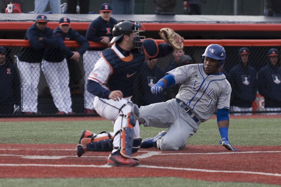 Senior outfielder Demetre Taylor slides into home during the Panthers 9-7 loss against Illinois on Tuesday at Illinois Field in Champaign. Taylor had two runs, two hits and two RBIs in the game.