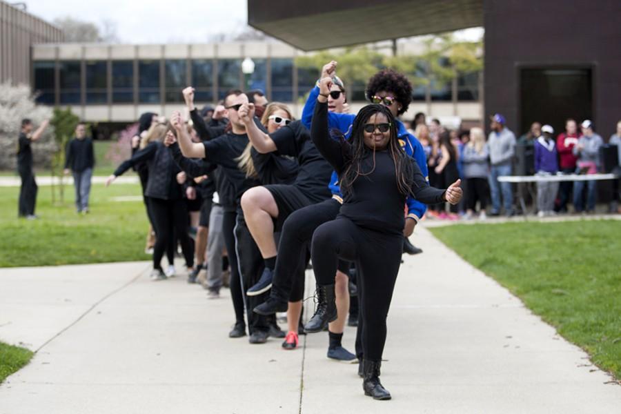 Greeks goin’ up on a Thursday while dancing during the Greek Week Unity Stroll event in front of Doudna Steps.