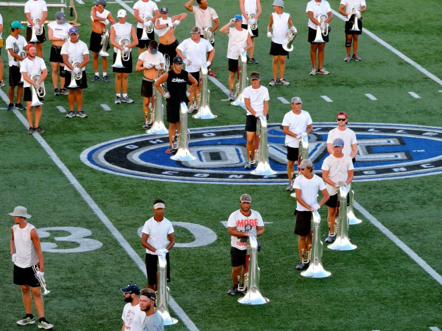 The Madison Scouts stand in formation during their performance Tuesday evening. The Scouts 2016 field show is titled “Judas,” featuring music from Jesus Christ Superstar by Andrew Lloyd Webber. They will tour their show across the country over the summer before competing in the Drum Corps International World Championships in mid-August.