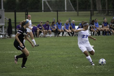 Freshman midfielder Angela Corcoran kicks the ball during an exhibition match against Evansville on Aug. 14 at Lakeside Field.