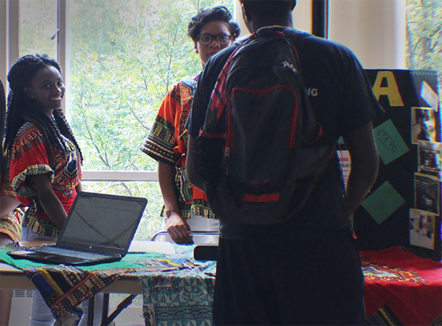 African Student Association students discuss their organization with another student during Wednesday’s Pantherpalooza.