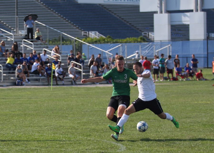 Sophomore Forward Trevor Kerns advances the ball in a match against Marshall on Sunday. Panthers lost 1-0, finished with one shot on goal.