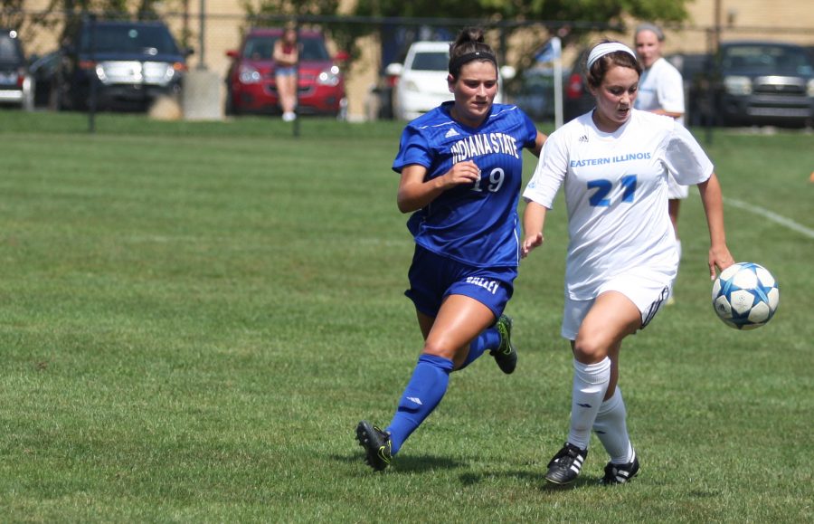 Elizabeth Held, a junior midfielder, fights for position against an Indiana State defender on Sunday at Lakeside Field. The Panthers lost the match 0-2.