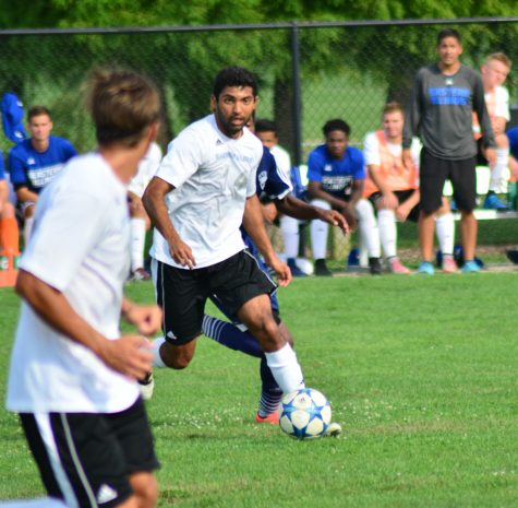 Junior Zach Medawattge looks for an open teammate to pass to during Wednesday's match againts Saint Ambrose. Medawattge exited the match in the first half with an injury and is currently day-to-day.