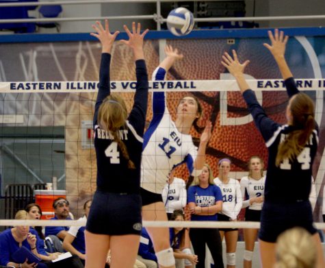 Middlehitter Abby Knight spikes the ball against Belmont defenders Friday at Lantz Arena. The Panthers fell 1-3 in four sets.