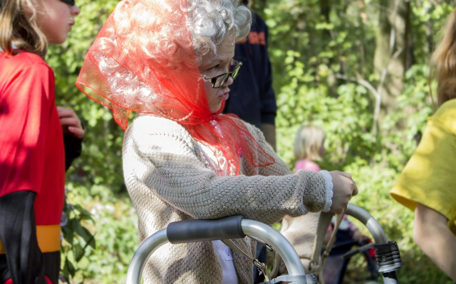 Seven-year-old Xoey Swope, a Mattoon resident, waits in line for her turn to show off her costume to the judges durning the costume contest at the “Fall Family Festival” hosted by Douglas-Hart Nature Center Saturday. Swope won an award for the funniest costume in her division.