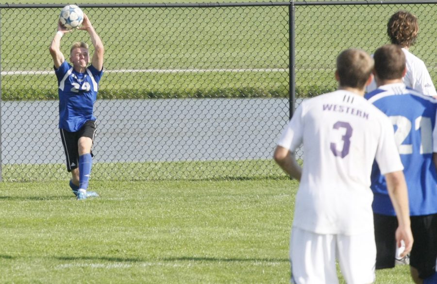 JuniorTyler Enright throws the ball in during a match against Western on Saturday, Oct. 29. The Panthers will face off against Omaha in the opening round of the Summit League Tournament today at 2 p.m.