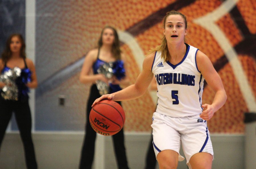 Junior gaurd Grace Lennox looks for an open teammate Friday at Lantz Arena in the Panthers season opening 97-54 win over Millikin.