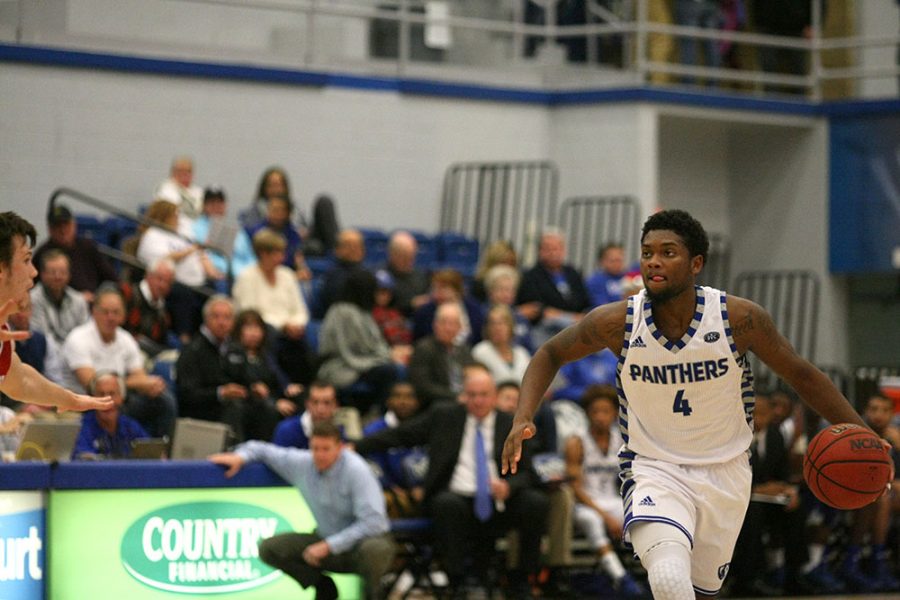 Junior guard Montell Goodwin dribbles down court during the Panthers’ 87-83 overtime loss to Bradley Nov. 29.