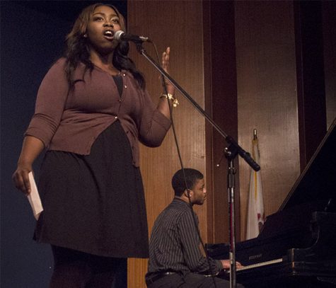 Jenel Murray, a community member and former Eastern student, sings the Black National Anthem during the Martin Luther King Jr. ceremony in the Grand Ballroom of the Martin Luther King Jr. University Union.