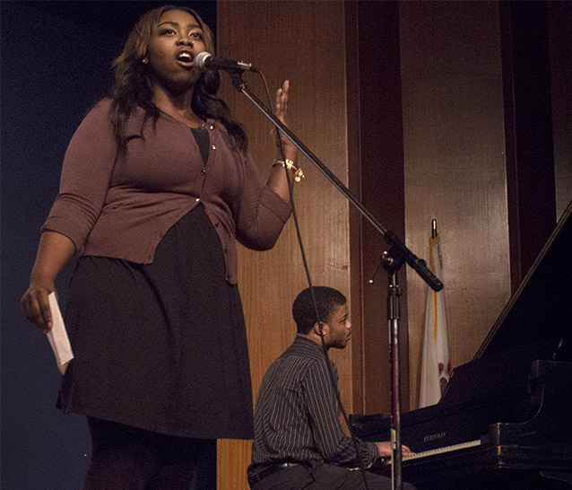 Jenel+Murray%2C+a+community+member+and+former+Eastern+student%2C+sings+the+Black+National+Anthem+during+the+Martin+Luther+King+Jr.+ceremony+in+the+Grand+Ballroom+of+the+Martin+Luther+King+Jr.+University+Union.