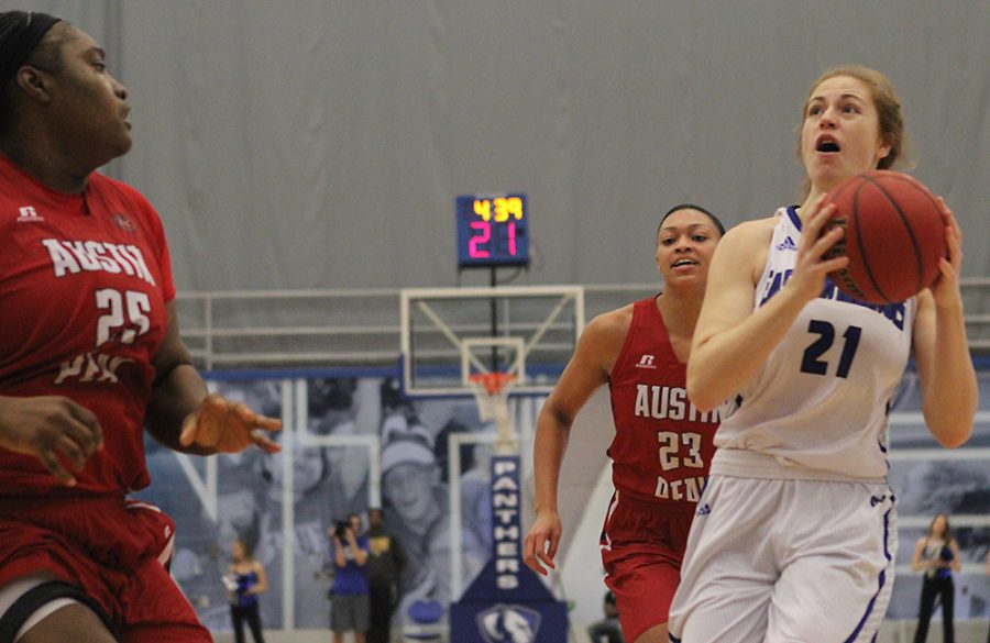 Sophomore forward Halle Stull drives to the basket against Austin Peay Tearra Banks Saturday at Lantz Arena. The Governors defeated the Panthers 69-59.