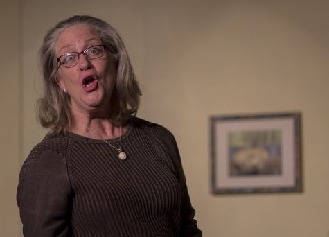 Kathryn Stewart, director of “Shirley Valentine” glances at the camera before the plays rehearsel Monday at Tarble Arts Center. Stewart said the show is funny but you will laugh more than you cry.