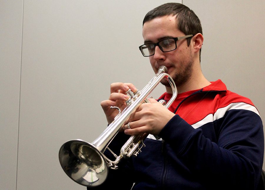 Freshman music major Brandon Colmark practices playing the trumpet in the Doudna Fine Arts Center. Colmark, from Sterling, Ill, has a concentration in trumpet performance and said, I practice a minimum of 2.5 hours a day, so I can become the best musician I can possibly be.