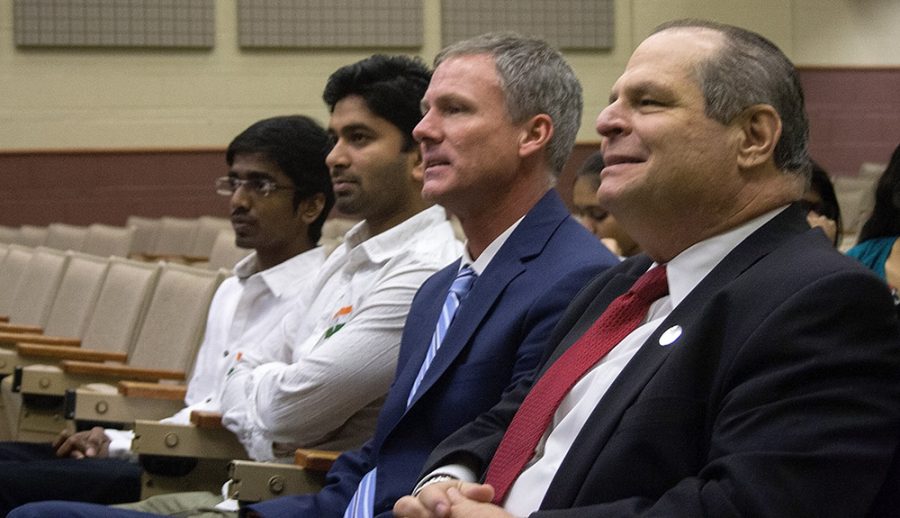 Eastern President, David M. Glassman and Interim Dean of the Graduate School, Dr. Ryan C. Hendrickson along with international graduate students Sushrut and Indhrasena Reddy listen to a historical speech of India on the ocassion of the sixty-eighth Republic day of India at Buzzard hall Thursday afternoon.