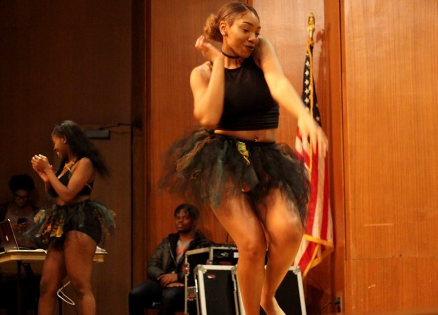 Brianna Torrance, a freshman family consumer sciences major, dances with the African Student Association Wednesday night at the comedy show as part of the kick off for African-American Heritage Month. ASA performed a combination of traditional African and modern dances and opened up for Xclusive the Comedian.