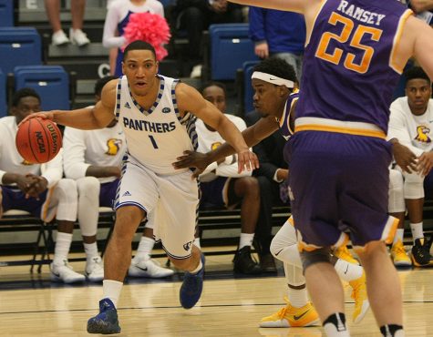Senior Demetrius McReynolds drives into the lane Saturday at Lantz Arena. McReynolds scored 10 points in the Panthers 87-68 loss to the Golden Eagles.