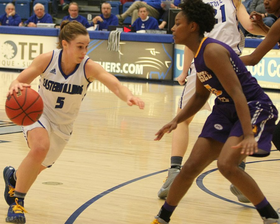 Junior guard Grace Lennox dribbles around Tennessee Tech defender Saturday at Lantz Arena.