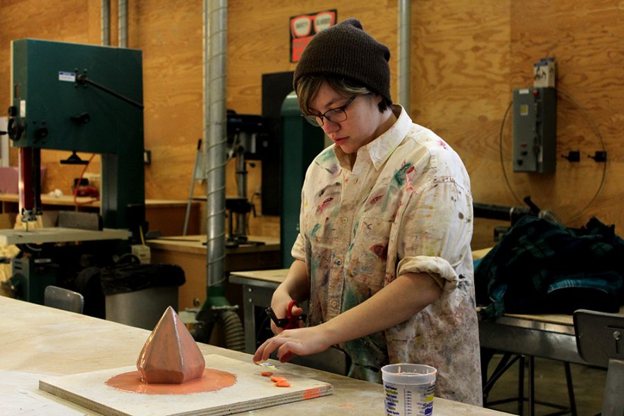 Brendalynn Triplett, a junior Art Education major from Hendersonville, Tennessee, works on a sculpture project in the Doudna Fine Arts Center. “The goal of the project is to create a pile of plaster diamonds. I want it to show a diamond in the rough. I’ll add mirrors on some of the sides, so that people will be able to see their reflection. It’s symbolic of how everyone is a diamond in the rough,” Brendalynn said.