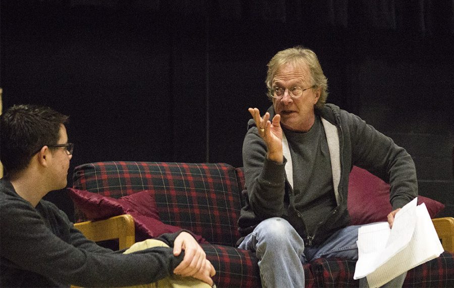 Gary Ambler, right, rehearses his lines for the play “Seminar” in the Black Box Theatre in the Donna Fine Arts Center.