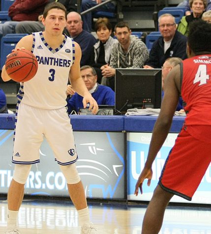 Sophomore guard Casey Teson sets the offense Saturday, Jan. 28 at Lantz Arena. The Panthers defeated the Cougars 75-60.