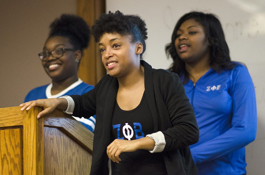 Senior Hillary Fuller, center, a communications studies major, Sierra Snell, left, a junior psychology major and Kyla Dixon, a junior sociology major presented a “Black Face: Then and Now” discusion and interacted with audience members Monday in Lumpkin Auditorium.