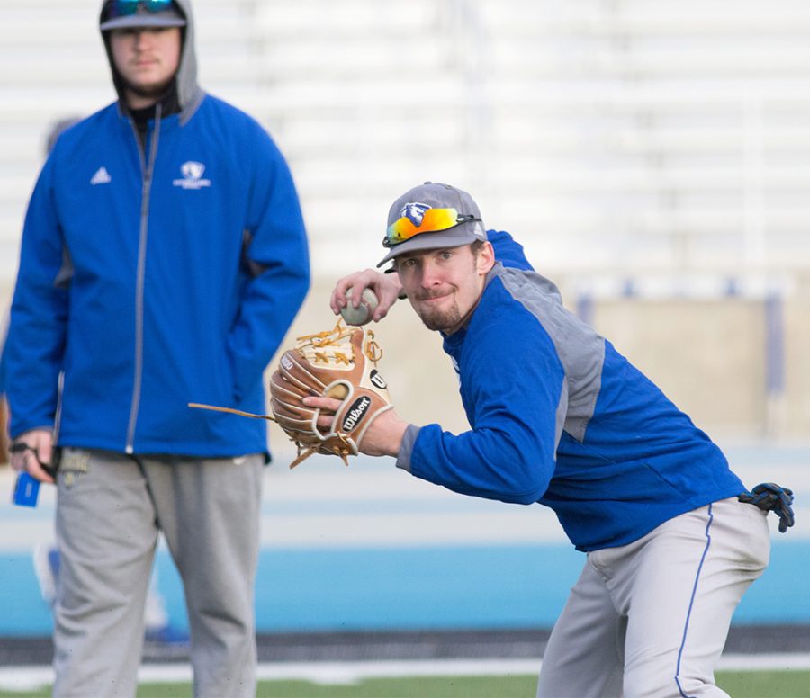 Sophomore infielder Jimmy Govern prepares to throw to first base after fielding a ground ball in a preseason scrimmage Monday, Feb. 13 at O’Bien Field.