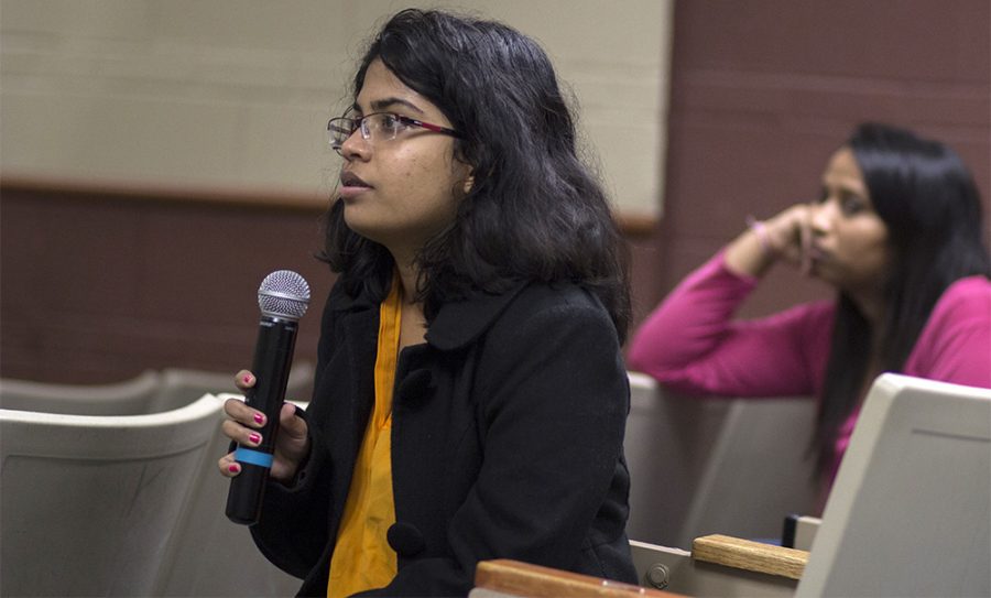 Hashni Vidana, a biological sciences graduate student asked asks a question of President Glassman during Monday night’s “Dr. G. You and Me” student forum in Buzzard Auditorium. Vidana suggested a mentoring program for all new students. She said while obtaining her Bachelor’s in England her mentor was very beneficial with basic things such as finding a grocery store and said all new students could benefit from a similar program.