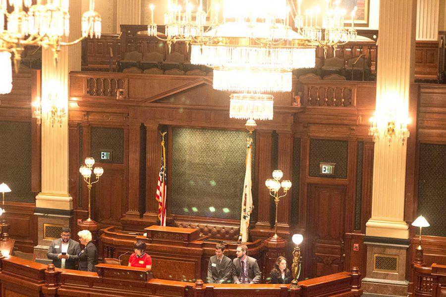 Model Illinois Government Students act as members of congress as they debate a mock case regarding immigration in The Illinois State Capitol House Chamber.