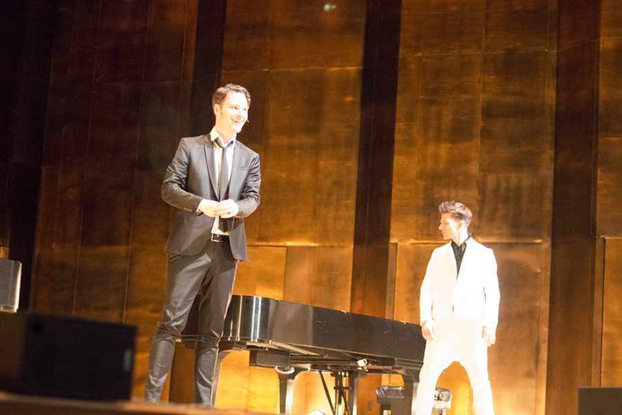 Paul Cibis smiles to the crowd after a piano competion with andreas Kern as part of The Piano Battle.