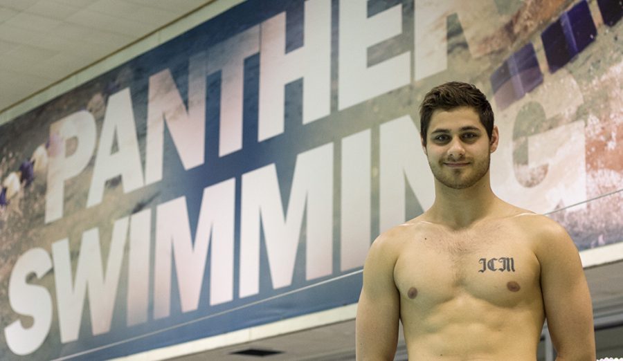Junior+Steve+Fishman+poses+for+a+picture+in+the+Padovan+Pool+on+Wednesday.+Fishman+broke+the+400-IM+school+record+with+a+time+of+4%3A03.76+at+Summit+League+Championships+after+injuring+his+right+collar+bone.