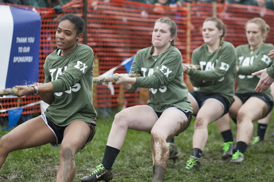 Members of Alpha Sigma Taus tugs team battle against Delta Delta Delta on Wednesday at the Campus Pond. Alpha Sigma Tau defeated Delta Delta Delta with a time of 2:10.