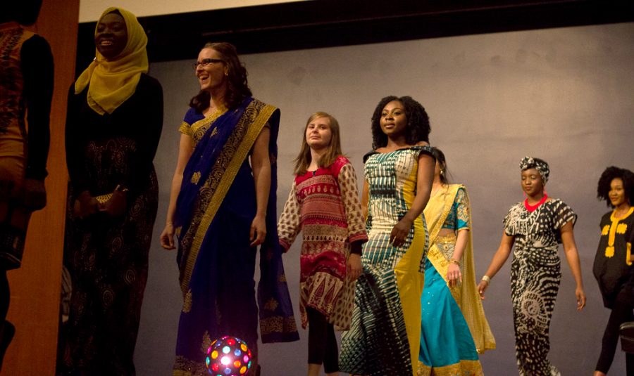Participants model various attire from different countries during the fashion show segment of the Association of International Students’ Global Cultural Night Saturday in the Grand Ballroom of the Martin Luther King Jr. Union.