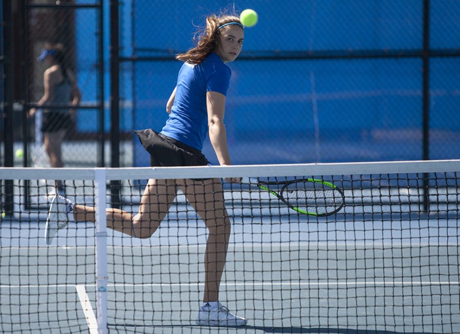 Freshman Stella Cliffe returns the ball at the net during her singles match against Austin Peays Helena Kuppig April 8, 2017, at the Darling Courts. Cliffe fell to Kuppig 6-2, 4-6, 6-4. Cliffe finished her first season this weekend during the OVC tournament defeating Southern Illinois Edwardsvilles Tiffany Hollebeck 6-4, 6-0.
