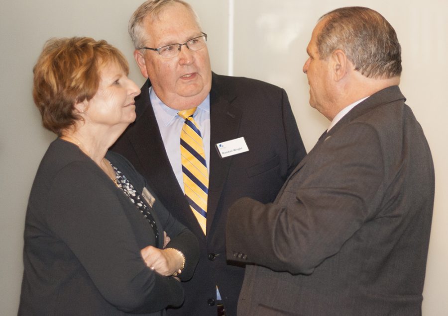 Randall and Brenda Wright talk with Eastern President David Glassman follwing the presentation of the 2107 Burnham and Nancy Neal Outstanding Philanthropost Awards at the Doudna Fine Arts Center Friday. Randall Wright, a Charleston native, said in addition to all of his relatives who attended Eastern, about half of them had also worked at the university. His mother worked in the former housekeeping department and his father oversaw the university post office, he said. “Eastern means a lot to our family overall… in terms of providing education to move us forward and as way to provide for families on a daily basis,” Wright said.