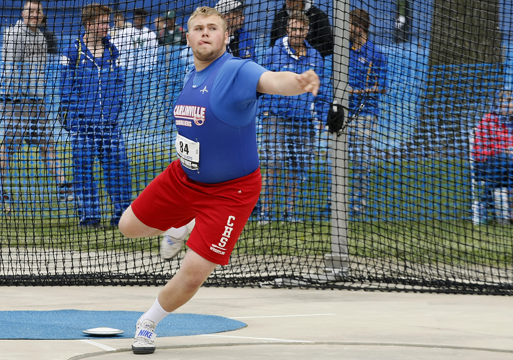 Daniel Card, a junior from Carlinville High School, competes in the class 1A discus throw Thursday at O’Brien Stadium during the preliminary rounds of the IHSA boys track meet.