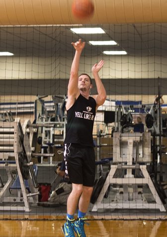 Christian Lohr shoots around with a basketball Friday afternoon at the Student Recreation Center.