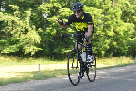 A cyclist competing in the 50-mile race races down hill near Lerna Road Saturday at the inaugural Tour de Charleston.