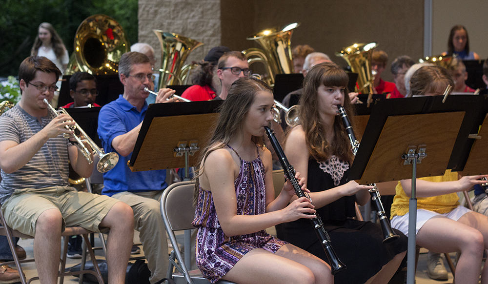 Members of the Charleston Community Band perform last Thursday during their weekly concert at Kiwanis Park.