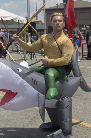 Justin Olinghouse, dressed as Aquaman, poses Sunday during the Superman Festival in Metropolis.