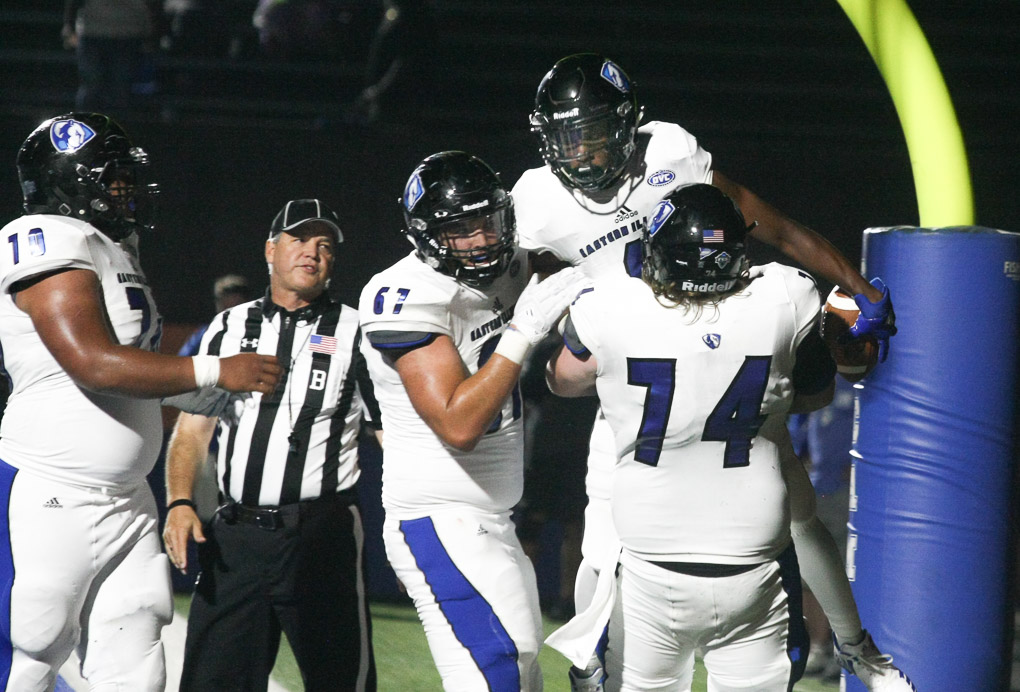Senior Dennis Turner celebrates after catching a touchdown pass to put Eastern ahead late in the fourth quarter Thursday at Indiana State. The touchdown pass was the third of the game for Turner.