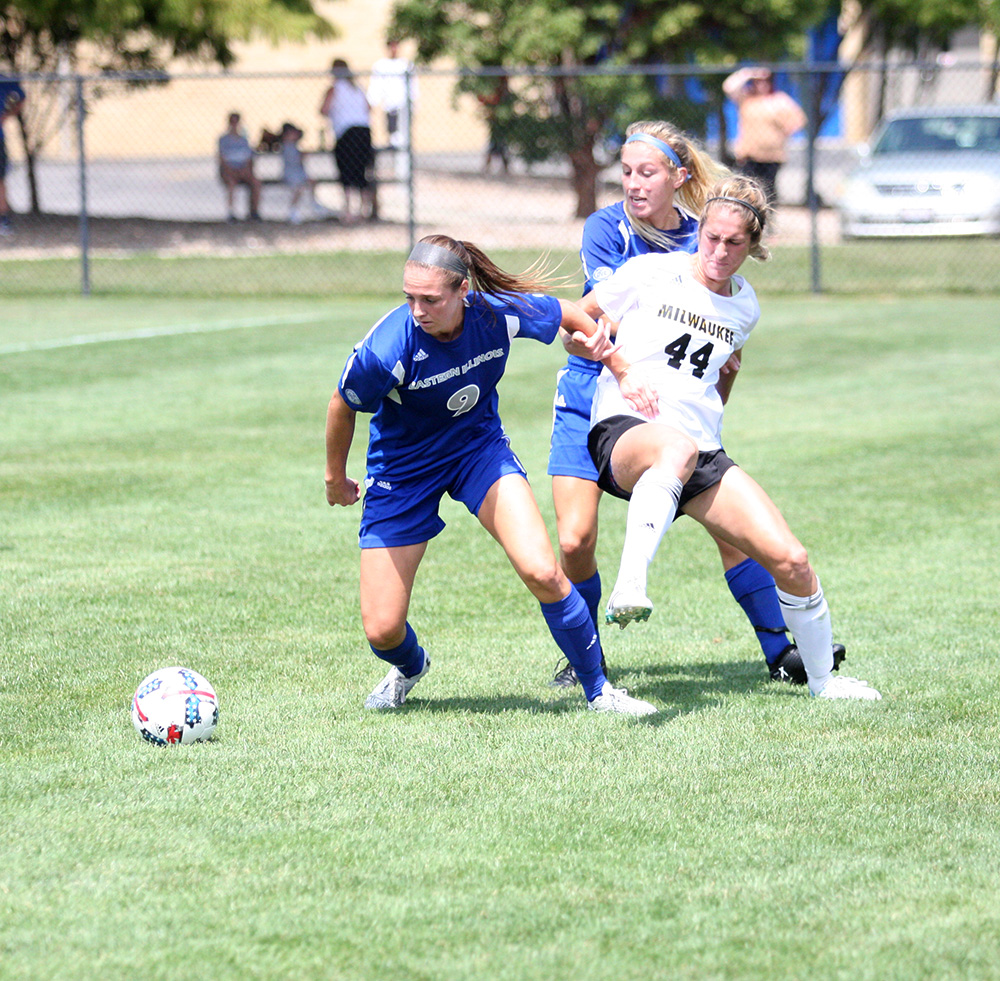 Forward Sarah DeWolf, No.9, and defender Lindsey Carlson, No.27, fight for the ball against a UW-Milwaukee attacker. The Panthers lost the Sunday afternoon game 2-0 at Lakeside Field.