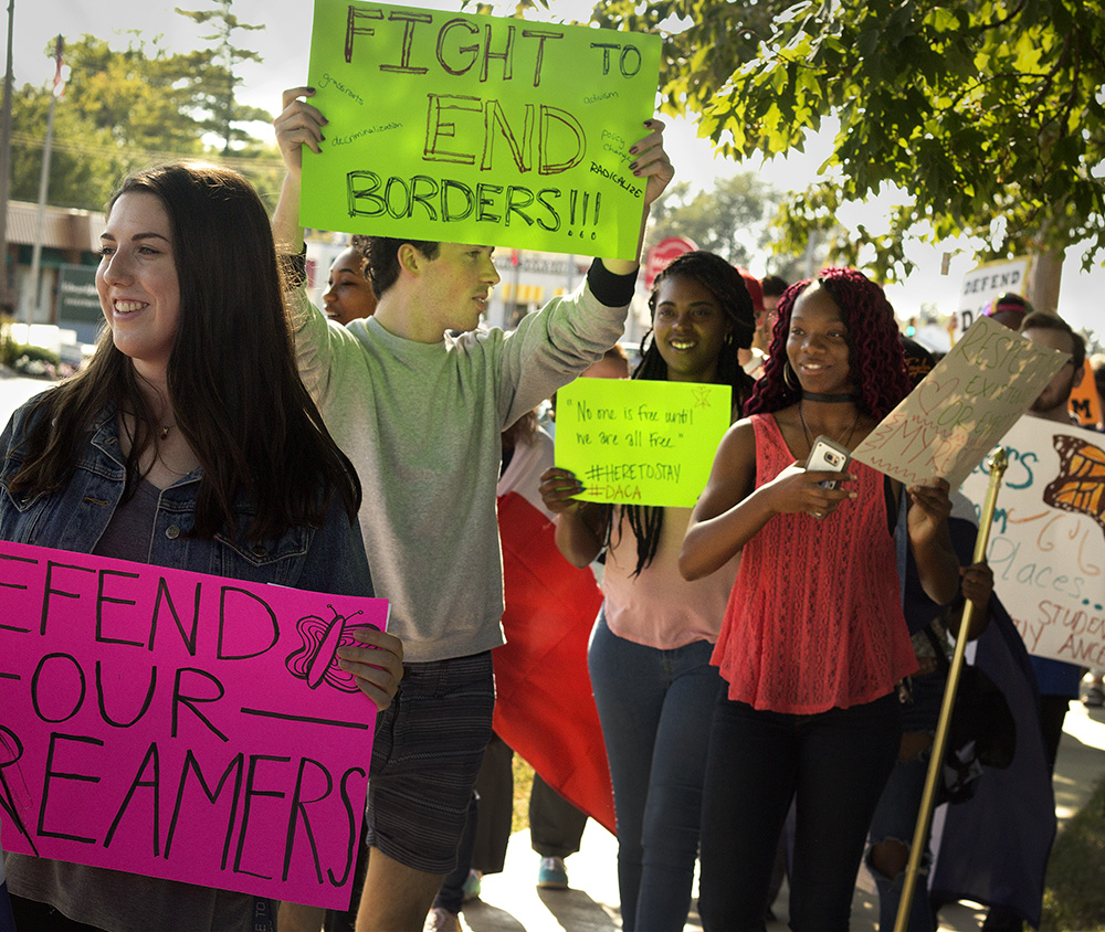 Eastern students protest the repeal of the Deferred Action of Childhood Arrivals program on Friday Afternoon at Morton Park.
