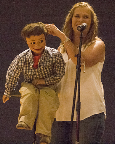 Ventriloquist Lynn Trefzger performs with her puppet Samuel in the Grand Ballroom of the Martin Luther King Jr. University Union Friday night. Samuel is the first puppet she ever used.