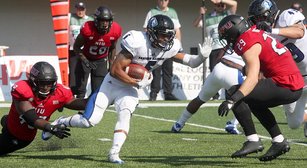 Redshirt senior safety Tray Mitchell breaks a Northern tackle and tries to stiff arm another player on his punt return in the Panthers’ 38-10 loss. Eastern hosts Illinois State this weekend for its home opener.