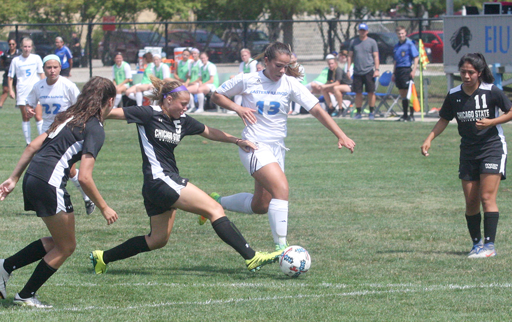 Sophomore Henar Urteaga drives past the Chicago State defenders in the Panthers’ 5-1 win at Lakeside Field Sept. 3. Eastern is 3-2 to start its season.