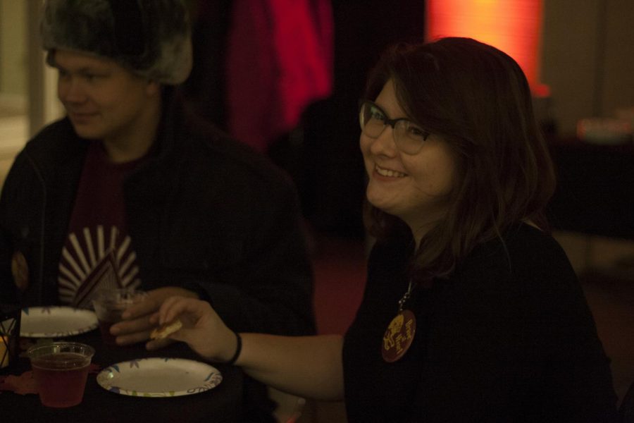 Grace O’Brien, a Graphics Design major, eats with friends at the 2017 Tarble After Hours Harry Potter pARTy at the Tarble Arts Center. “I’m glad about how creatively it came out,” O’Brien said. “There are wide variety of activities, and it looks like who ever showed up is having a great time.” 