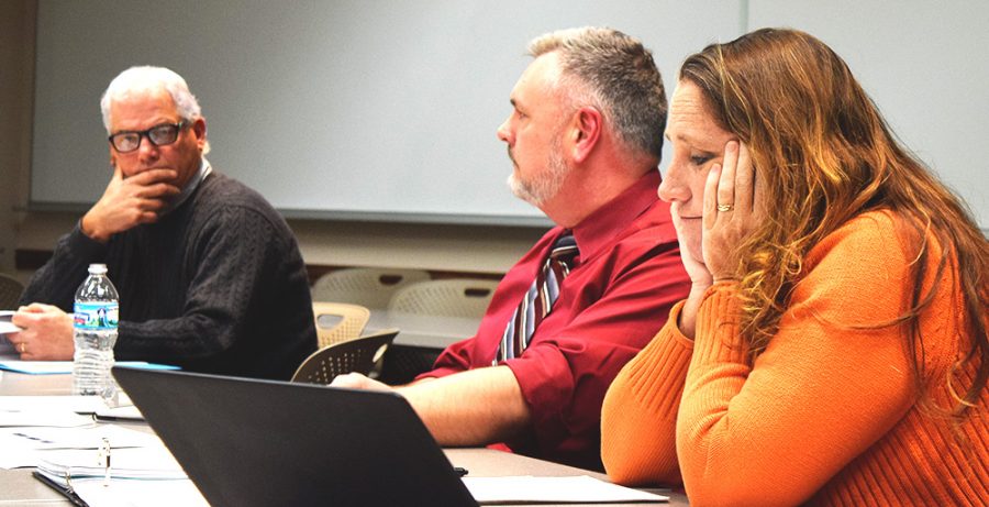 English Department Chair Dana Ringuette, Institutional Repository Librarian Todd Bruns, and Rebecca Throneburg, communication and disorders and sciences professor, listen to discussions about the potential schedule change. Bruns said he was interested in the potential four day week, with oppositions coming from Douglas Klarup, interim dean and professor of analytical chemistry.