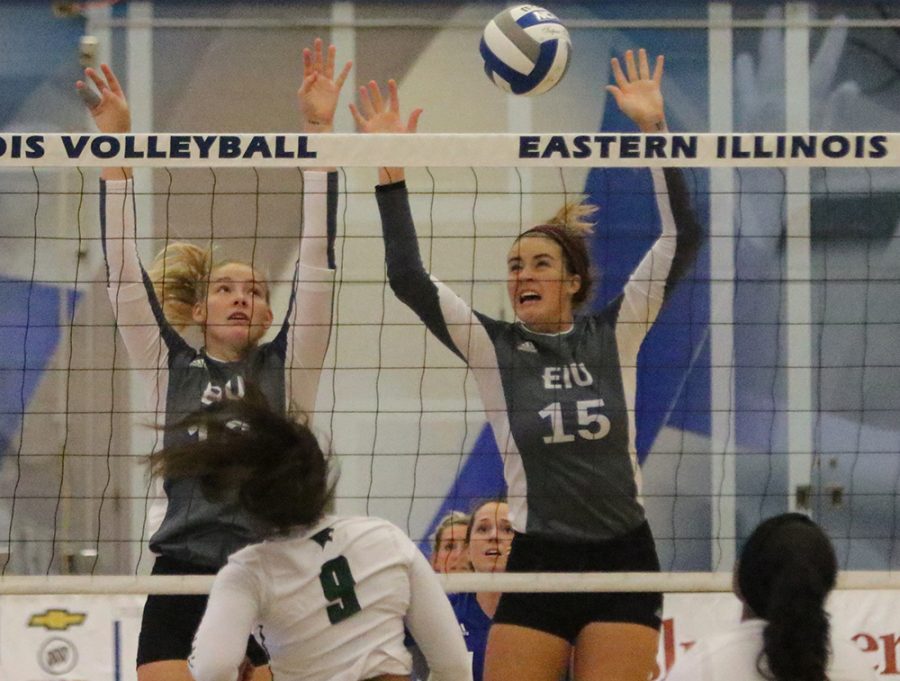 Laurel Bailey and Maggie Runge go up for a block in Eastern’s game against Chicago State on Sep. 9. The Panthers lost the match 2-3 at Lantz Arena.