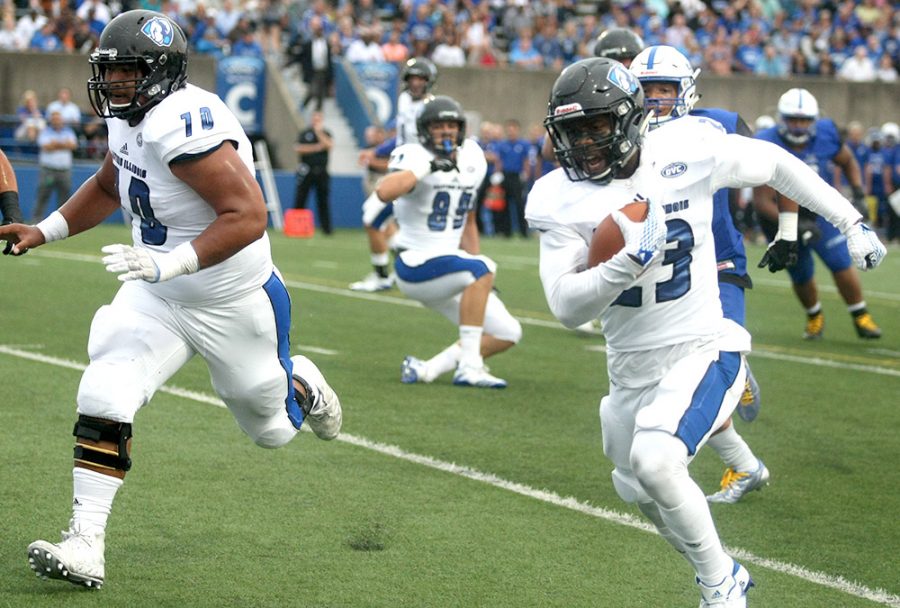 Junior running back Isaiah Johnson rushes in a touchdown against Indiana State Aug. 31 in Terre Haute. Eastern hosts Tennessee Tech this weekend for the Hall of Fame game.